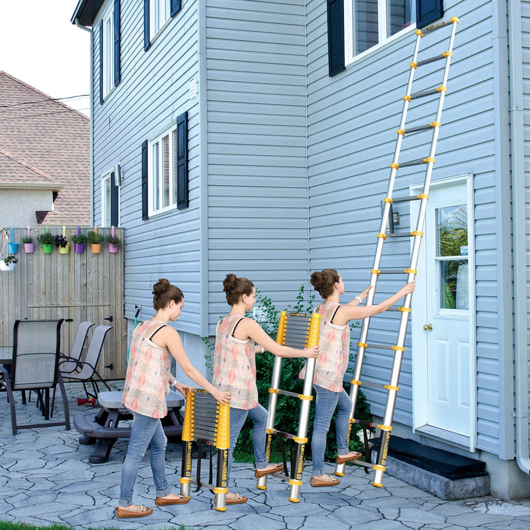 Woman extending the Metaltech telescopic ladder to reach a second-story exterior wall